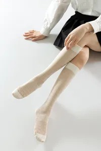 White sheer JK knee high socks with heart diamond pattern for women, spring summer leg wear detail