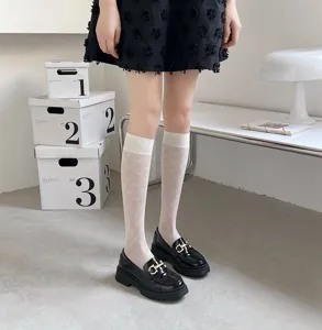 Women white sheer mid-calf socks, cute summer breathable hosiery for daily wear.