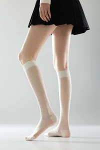 White sheer mid-calf socks with heart diamond pattern, stylish Japanese JK style knee highs.