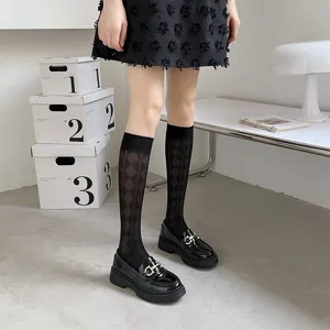 Summer sheer translucent calf socks for women, cute Japanese JK style mid-calf hosiery.