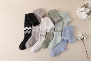 Cozy fuzzy coral fleece over-the-knee socks detail shot, showing soft texture and chevron pattern.