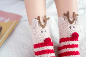 Cute Christmas coral fleece socks for women, warm fluffy winter sleep socks with 3D deer.