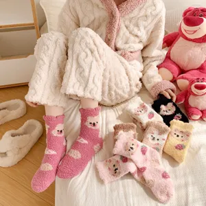 Thickened coral fleece women socks featuring cute bear and strawberry patterns for cozy winter home.