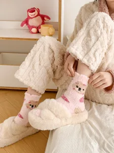 Fluffy coral fleece bear socks for women, thick cozy winter sleep socks with cute design.