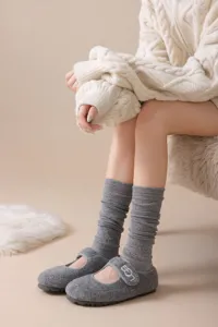 Wool knit slouchy socks paired with stylish comfort shoes, cozy autumn winter daily wear.