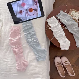 Scaldamuscoli stile ballet core con fiocchi carini, calze lunghe staffa lavorate a maglia.