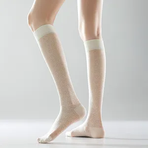 White sheer knee-high socks with cute heart and diamond patterns, perfect for sweet JK style.