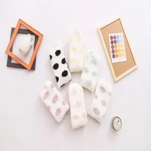 Soft coral fleece fuzzy socks for women, cute polka dot winter warm thermal sleep crew socks.