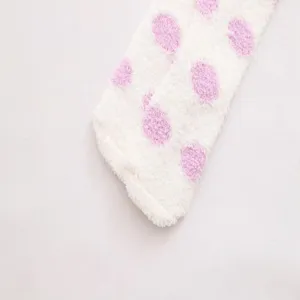 Cute polka dot coral fleece over-the-knee socks for women, cozy winter sleep thigh high socks.
