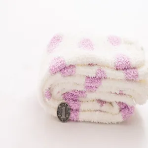 Cute fluffy polka dot over-knee coral fleece socks for women, cozy winter warm long stockings.
