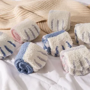 Cute fuzzy coral fleece socks for women, soft plush sleep floor socks rolled in cozy set.