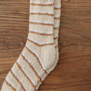 Cozy coral fleece winter socks detail, thick warm striped floor socks for home comfort.