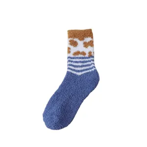 Cozy fuzzy coral fleece winter thermal socks for women, blue mid-tube soft warm floor socks.