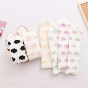 Cute polka dot coral fleece over-the-knee socks for women, cozy winter thermal sleep socks.