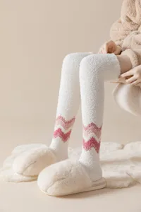 Cozy fluffy over-the-knee socks detail view, soft thick warm thermal loungewear fleece socks.