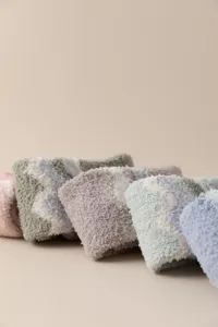 Soft fluffy coral fleece fuzzy socks detail view, warm winter textured lounge sleep socks.