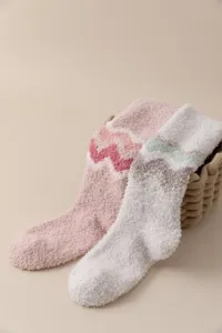 Fluffy coral fleece long socks detail showing soft warm texture and cute wave pattern winter