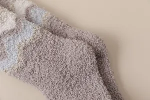 Cozy winter fuzzy long socks for women, thick soft warm home floor stockings with wave pattern.
