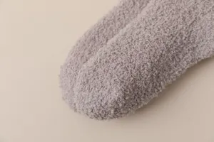 Detailed view of women's ultra-soft fuzzy coral fleece winter warm thermal socks texture close up