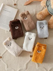 Cute fuzzy bear ear mid-calf socks detail, soft plush winter warm coral fleece sleep socks.