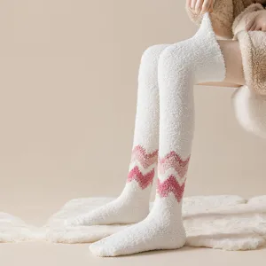 Thermal fuzzy over-the-knee socks for women, cozy winter long plush fleece stockings.