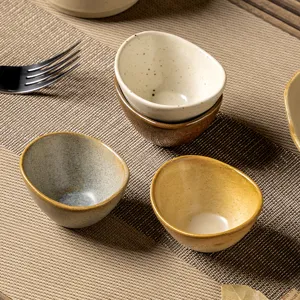 Japanese retro ceramic small sauce dish creative irregular dipping bowl for home and restaurant.