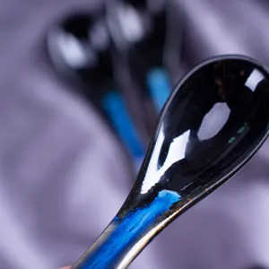 Ceramic soup spoon with unique blue kiln change glaze, long handle creative tableware design.
