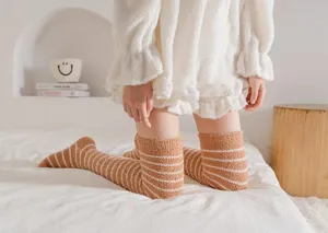 Cozy winter fuzzy striped over-the-knee socks detail view, soft coral fleece for warm home wear.