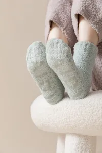 Cozy coral fleece winter socks detail, anti-slip silicone grip sole, warm sleeping floor socks