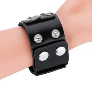 Wide black leather punk bracelet with metal snaps, vintage gothic wristband for daily.