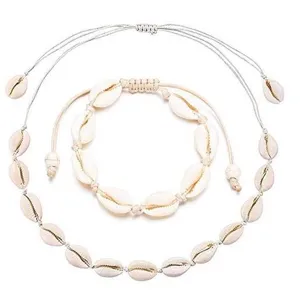 Conjunto de joyas de concha natural collar y pulsera bohemia cauri ajustable vista principal.