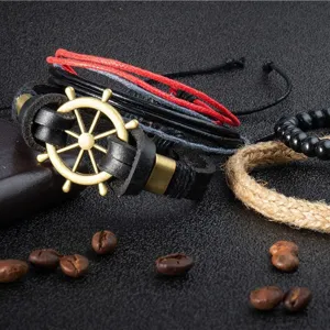 Handmade multi-layer braided leather bracelet set featuring vintage ship wheel charm for men