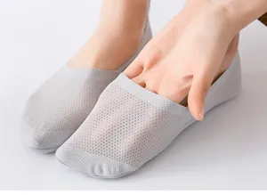 Closeup view of women breathable mesh ice silk boat socks detail showing thin texture.