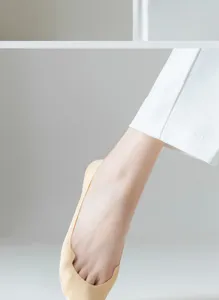 Close-up detail of women's shallow boat socks showing invisible breathable texture and design.