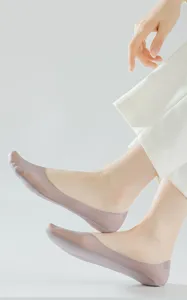 Close-up detail of ultra-thin breathable women invisible socks showing seamless fit.