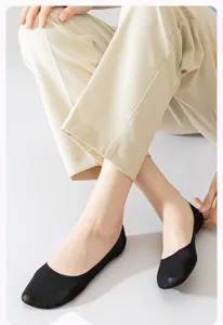 Detail view of women's black ice silk shallow invisible boat socks, breathable and thin design.