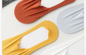 Men's breathable mesh no-show socks close-up, thin summer low cut anti-slip invisible short socks.