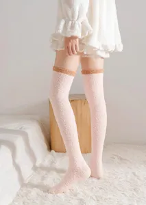 Cozy winter over-the-knee coral fleece fuzzy socks for women, warm thick thigh high stockings.