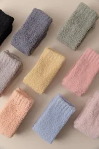 Thickened coral fleece cozy socks detail view, soft warm winter sleep socks in multiple solid colors.