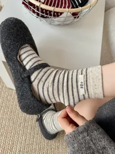 Minimalist women striped wool socks cozy mid tube cashmere socks with cute egg label design.