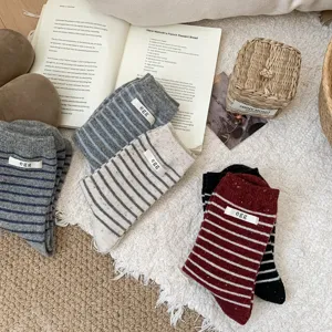 Cozy striped wool socks for women, cute Korean style mid-calf thermal winter socks.