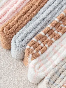 Cozy coral fleece fuzzy winter socks detail macro shot soft plush texture cozy home wear