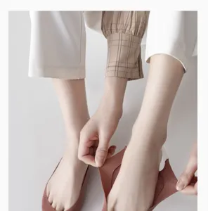 Close-up shot of women shallow invisible boat socks, thin breathable summer foot liner wear.