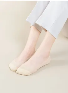 Detail view of breathable mesh low cut boat socks worn on feet, showing thin texture and design.