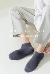 Detail view of men's breathable mesh ankle socks in dark grey, perfect for summer wear.