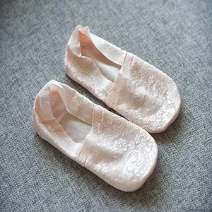 Detailed view of women's low-cut lace boat socks with floral pattern and anti-slip strap.