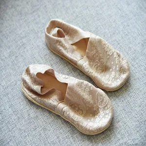 Detailed view of women lace boat socks with cross elastic straps and non-slip cotton sole.