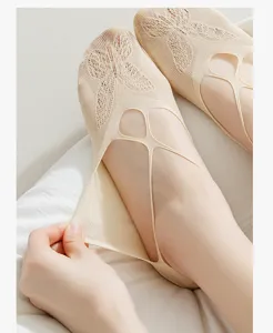 Close-up of women summer shallow invisible boat socks with mesh lace and cross straps design.