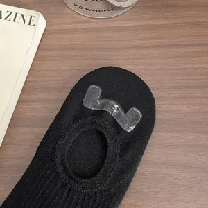 Black cotton invisible boat socks with silicone anti-slip heel grip for women daily wear.