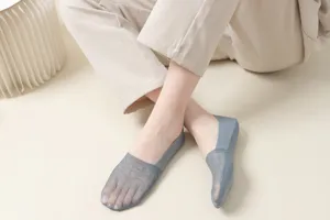 Detail view of women summer thin lace boat socks, breathable mesh invisible design for daily wear.